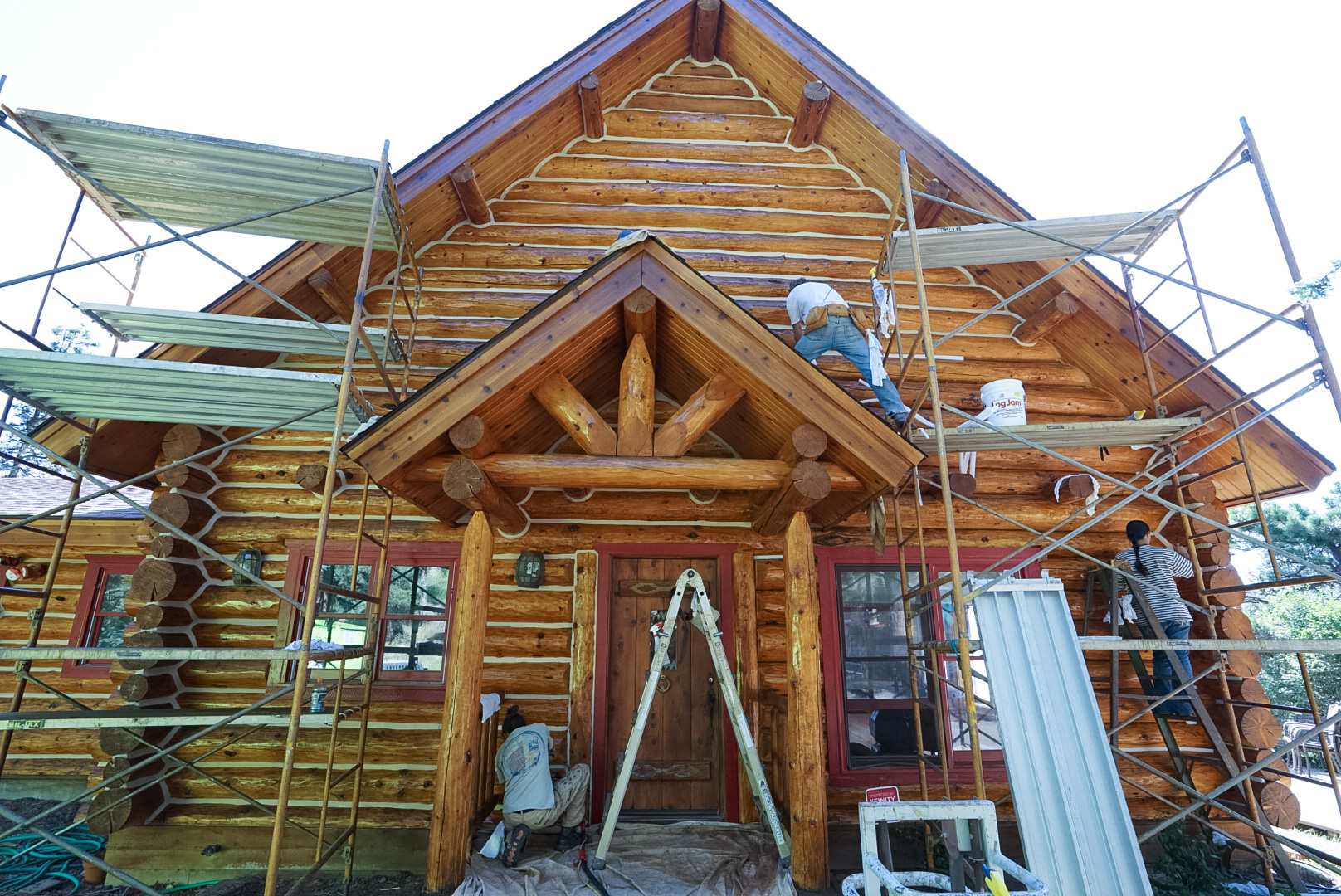 Park County log home restoration in Fairplay Colorado - professional chinking and staining services